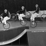 Spaceman pulling a huge manual