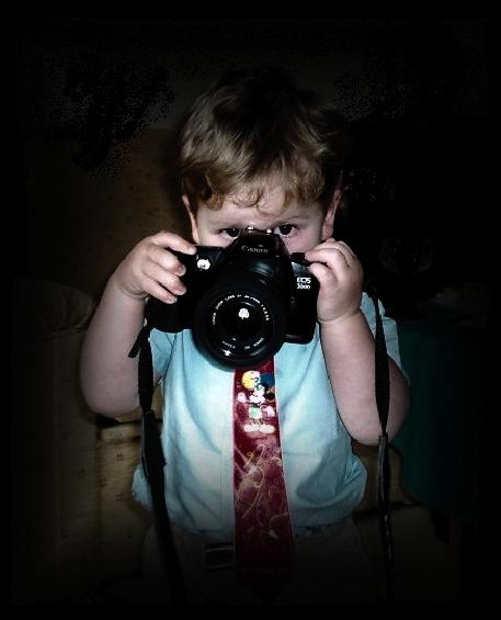 Fotograf.