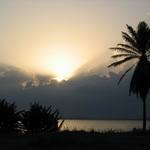 Oslnujici zapad slunce v Kinshase