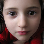 M.