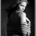 looking back over her shoulder