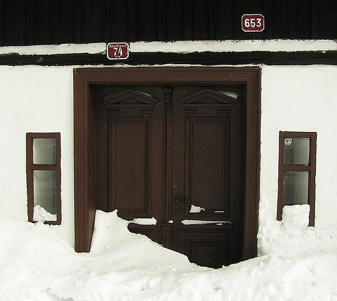 zasypáno