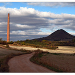 a path to a smoke stack