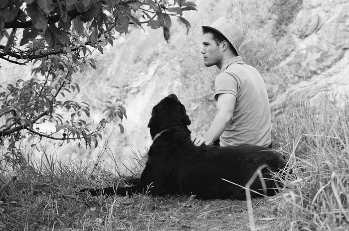 a boy with a dog