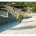 Nosič trávy v horské vesničce Xchaj