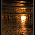 západ nad vypuštěným rybníkem