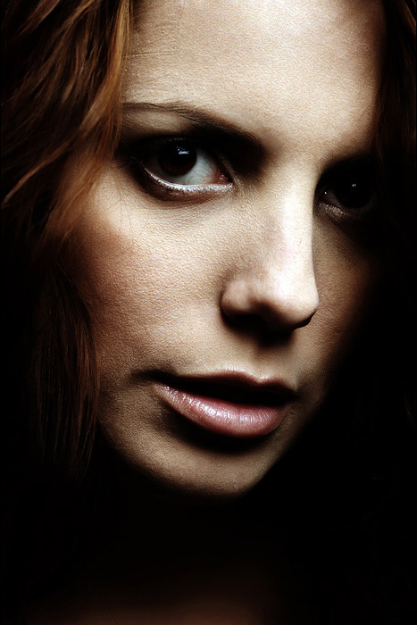 M.