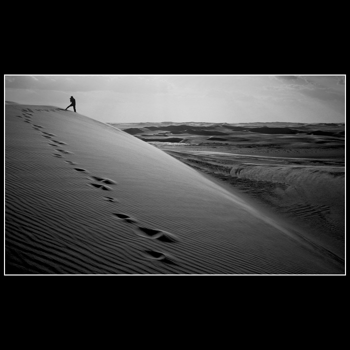 Fotofraf v dunách BW