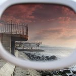 behind th glasses