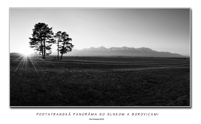 Podtatranská panoráma so slnkom a borovicami