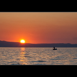 Rybář na lovu Slunce