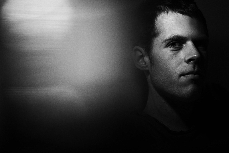 T.
