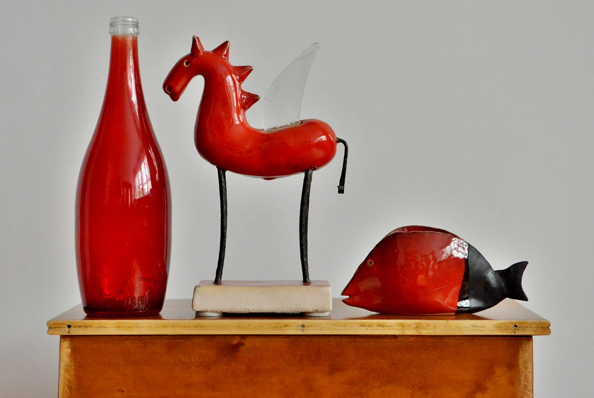 Botle, horse and fish