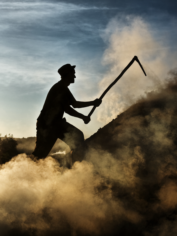 Charcoal pile dismantling