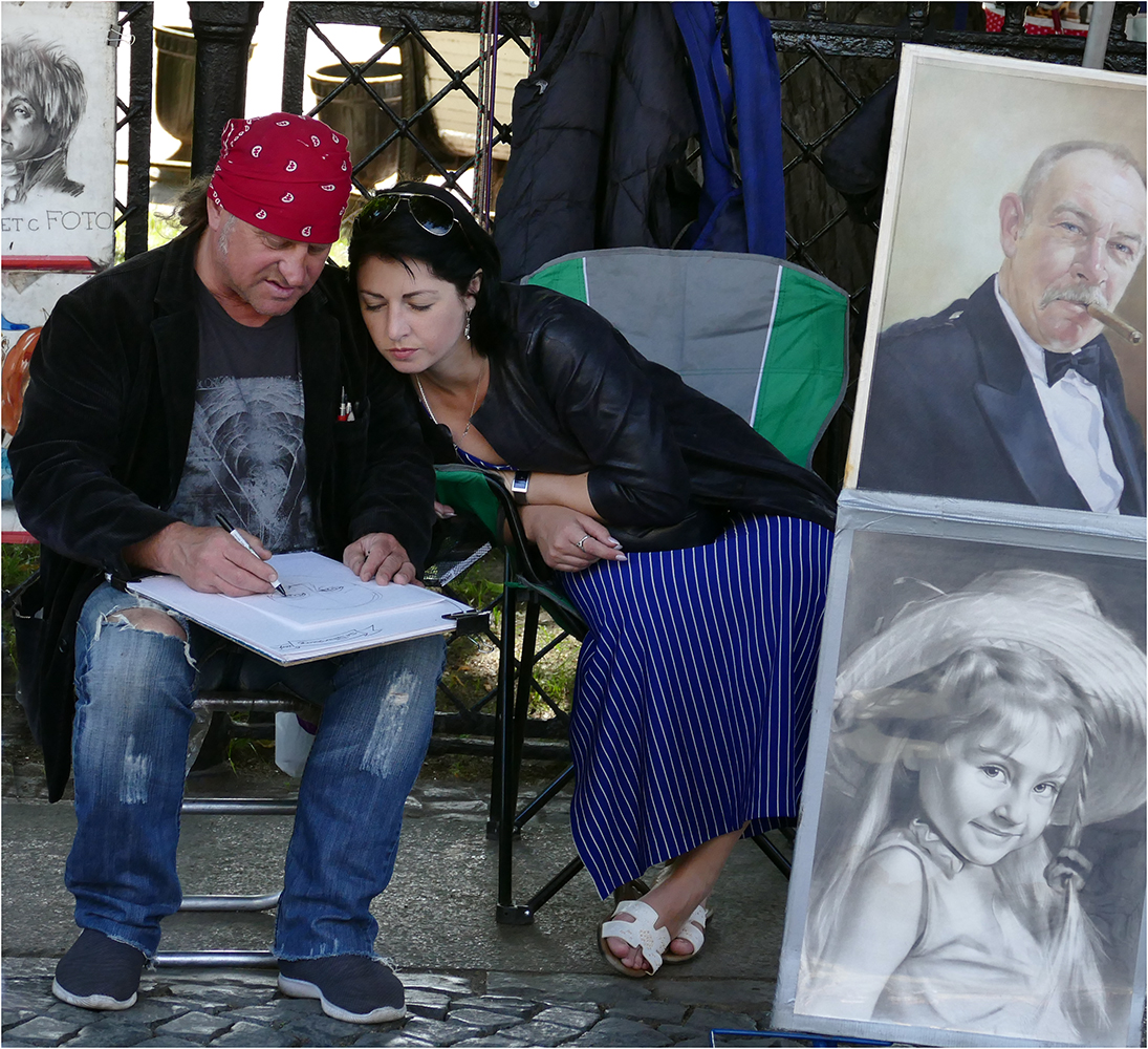 Pítěrský pouliční portrétista